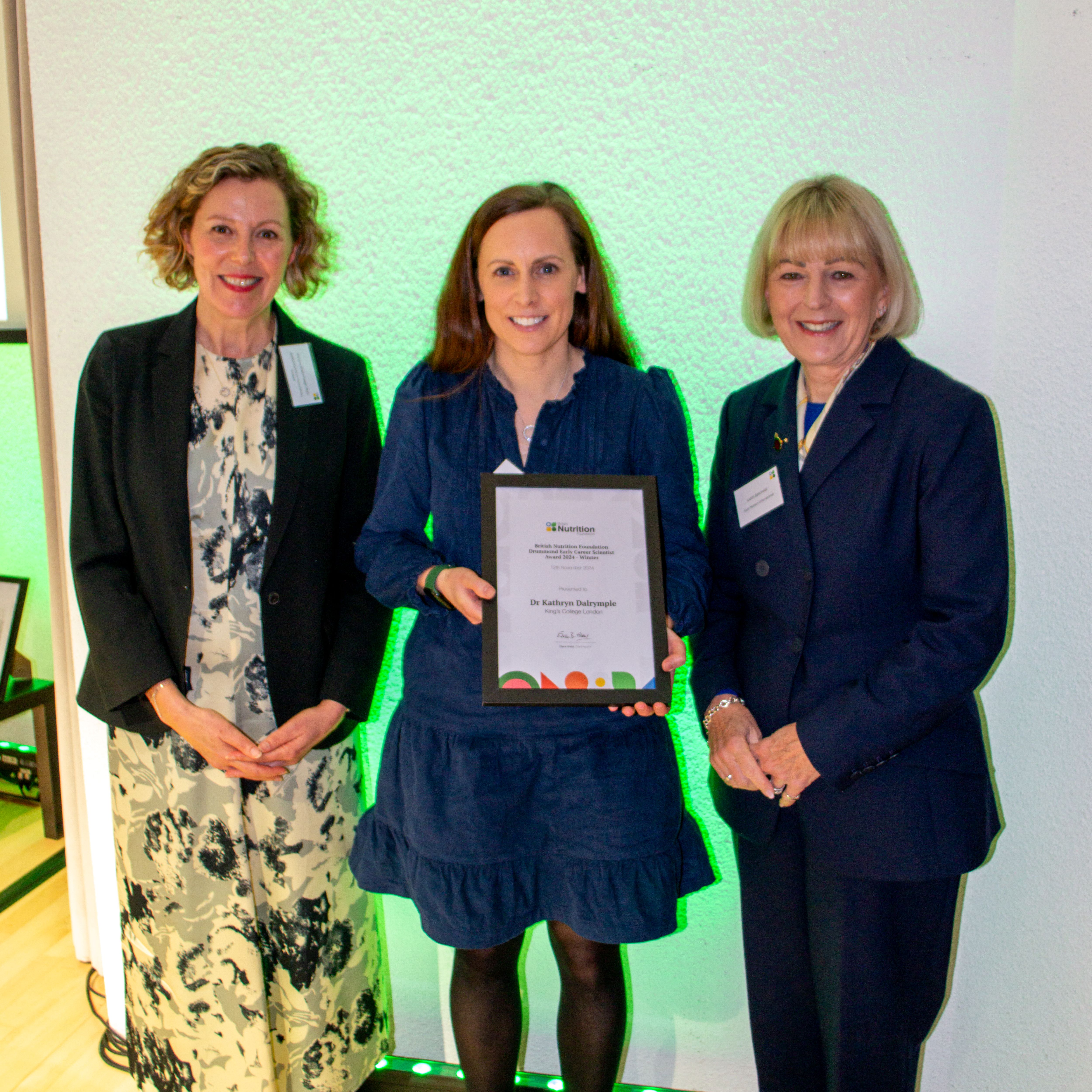 A photo of Dr Kathryn Dalrymple receiving her award at the BNF Annual Conference